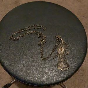 This is a very unique peacock necklace.